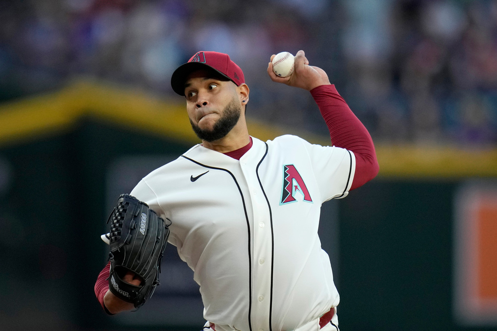 Arizona Diamondbacks starting pitcher Eduardo Rodriguez throws against the Pittsburgh Pirates during the first inning of a baseball game, Tuesday, May 5, 2026, in Phoenix. (AP Photo/Ross D. Franklin)