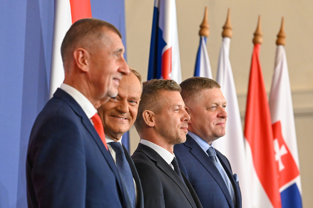 From left, Czech Republic's Premier Andrej Babis, Poland's Premier Donald Tusk, Hungary's Premier Peter Magyar and Slovakia's Premier Robert Fico arrive for a press conference to conclude the one-day the summit of the Visegrad Group (V4) countries in the Royal Castle in Godollo, northern Hungary, Tuesday, June 23, 2026. (Tibor Illyes/MTI via AP)