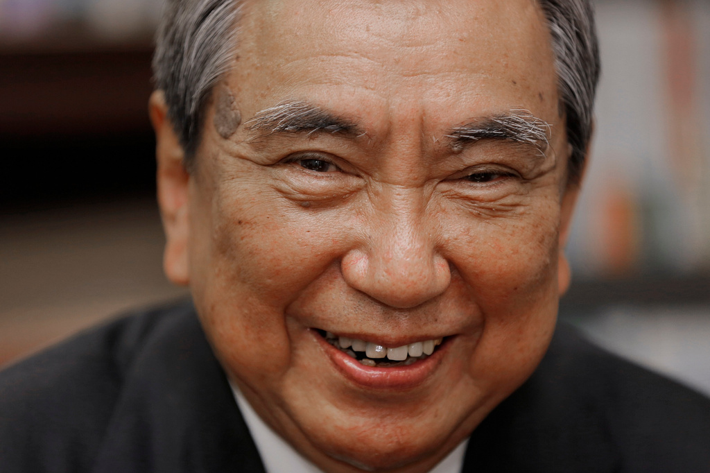 FILE - Retired politician Yohei Kono smiles during an interview with the Associated Press at his office in Tokyo, Tuesday, June. 25, 2013. (AP Photo/Itsuo Inouye, File)