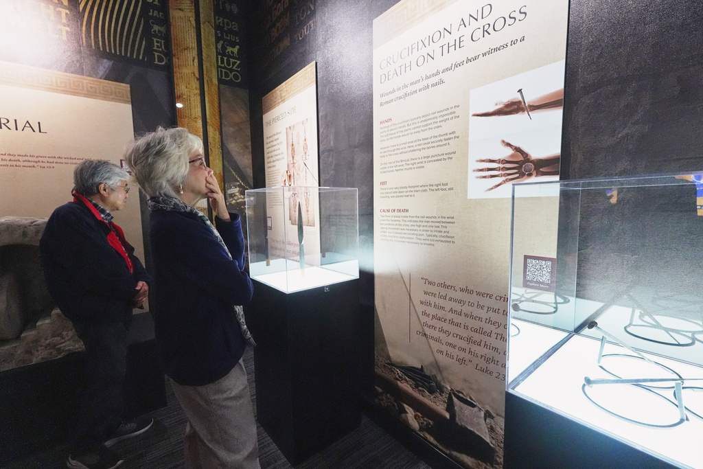 Visitors preview a new interactive museum dedicated to the Shroud of Turin, which some say was Jesus’ burial cloth around the time of his death, at the Christ Cathedral campus in Garden Grove, Calif., on Monday, Nov. 17, 2025. (AP Photo/Krysta Fauria)