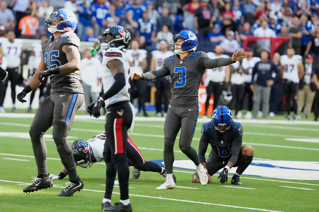 Indianapolis Colts kicker Spencer Shrader (3) watches his game-winning field goal against the Houston Texans during the second half of an NFL football game, Sunday, Sept. 27, 2026, in Indianapolis. (AP Photo/Michael Conroy)