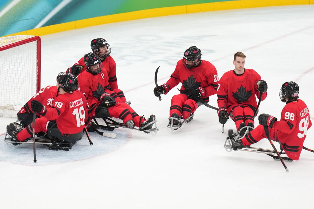 Canada's players reacts after loosing the ice hockey gold medal match between United States and Canada at the 2026 Winter Paralympics, in Milan, Italy, Sunday, March 15, 2026. (AP Photo/Antonio Calanni)