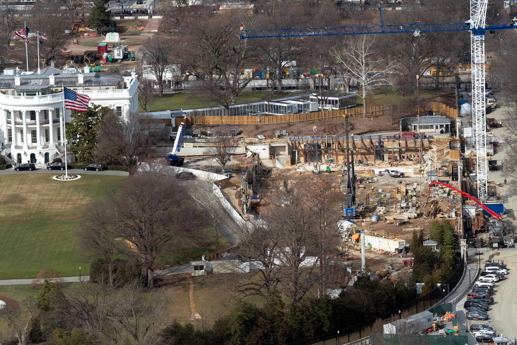 Work continues on the construction of the ballroom at the White House, Tuesday, Feb. 24, 2026, in Washington, where the East Wing once stood. (AP Photo/Jose Luis Magana)