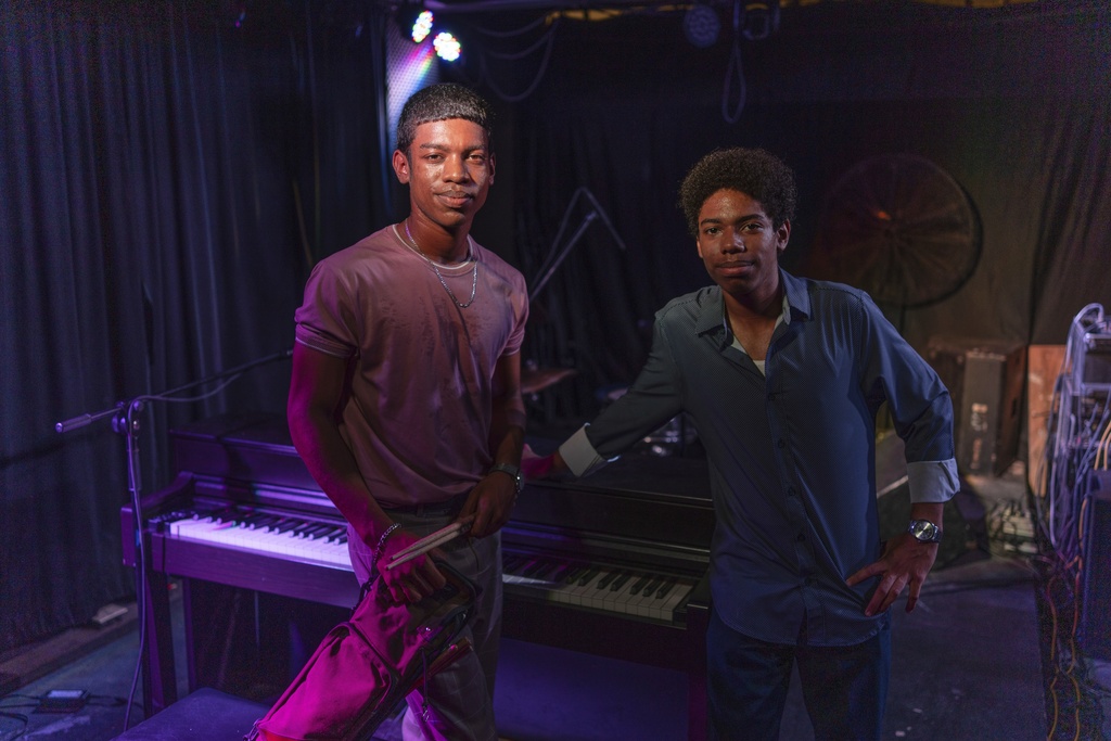 Fabio Abreu, left, and his brother Diego Abreu pose for a photo after their performance at La Fábrica de Arte Cubano, an art gallery and club in Havana, Thursday, Aug. 28, 2025. (AP Photo/Ramon Espinosa)