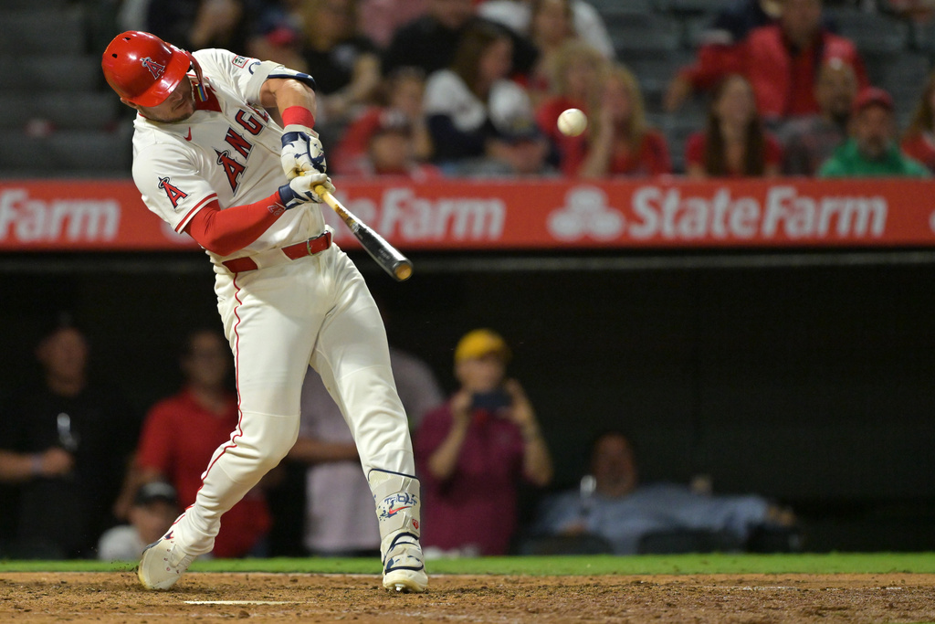Los Angeles Angels' Mike Trout hits a solo home run during the eighth inning of a baseball game against the Houston Astros, Friday, Sept. 26, 2025, in Anaheim, Calif. (AP Photo/Jayne Kamin-Oncea)