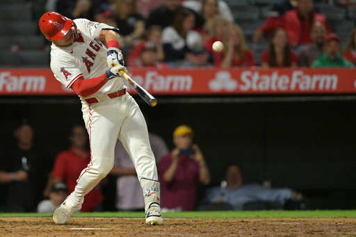 Los Angeles Angels' Mike Trout hits a solo home run during the eighth inning of a baseball game against the Houston Astros, Friday, Sept. 26, 2025, in Anaheim, Calif. (AP Photo/Jayne Kamin-Oncea) Los Angeles Angels' Mike Trout hits a solo home run during the eighth inning of a baseball game against the Houston Astros, Friday, Sept. 26, 2025, in Anaheim, Calif. (AP Photo/Jayne Kamin-Oncea)