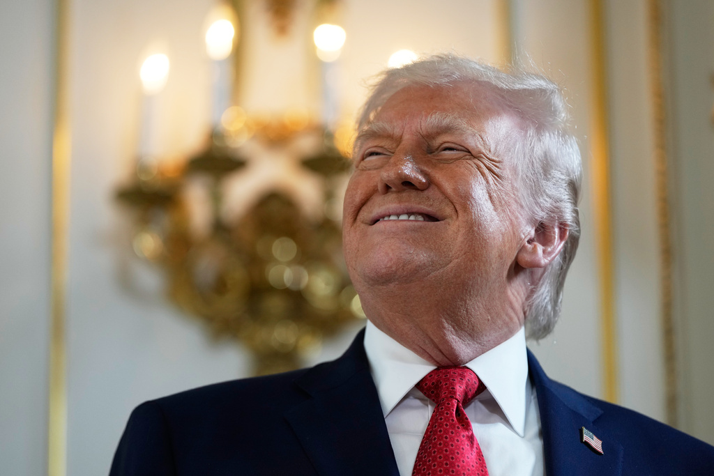President Donald Trump arrives at a dedication ceremony for a portion of Southern Boulevard, which the Town of Palm Beach Council recently voted to rename,"President Donald J. Trump Boulevard," Friday, Jan. 16, 2026, at his Mar-a-Lago Club in Palm Beach, Fla. (AP Photo/Julia Demaree Nikhinson)