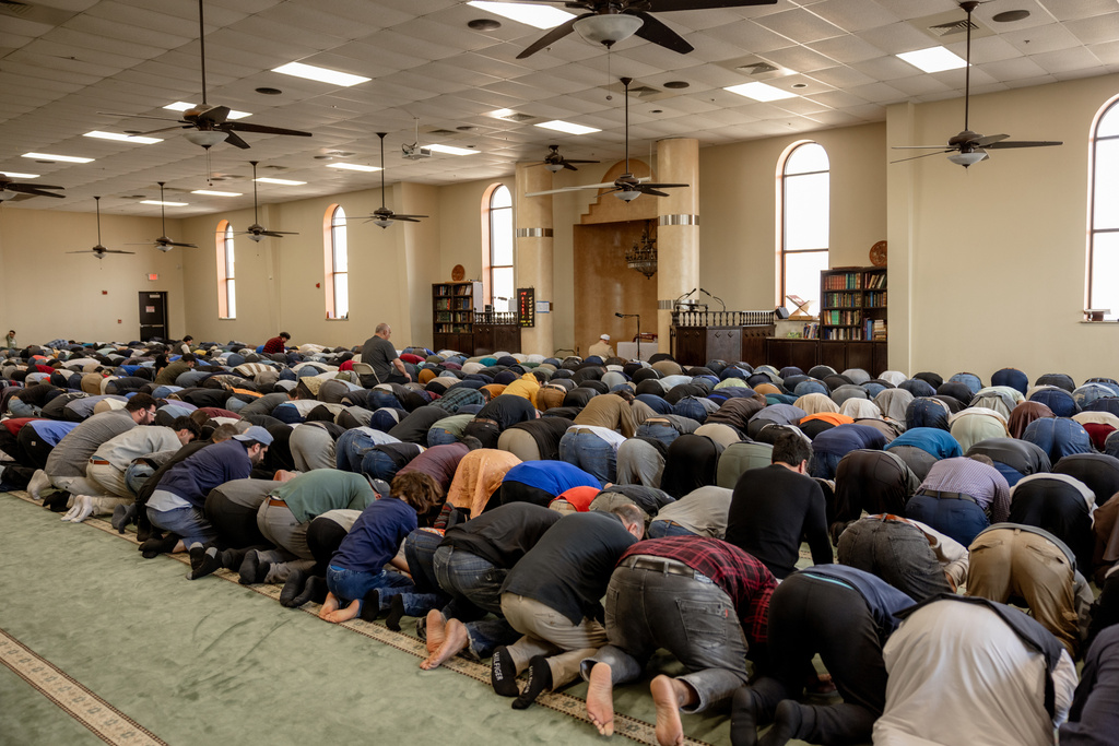 FILE - People pray at the Islamic Society of Tulsa, Friday, Feb. 13, 2026, in Tulsa, Okla. (AP Photo/Brittany Bendabout, File)