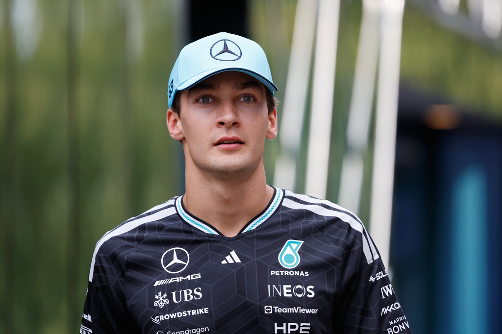 Mercedes driver George Russell of Britain walks in the drivers area ahead of the Formula One Grand Prix at the Spa-Francorchamps racetrack in Spa, Belgium, Thursday, July 16, 2026. (AP Photo/Geert Vanden Wijngaert)