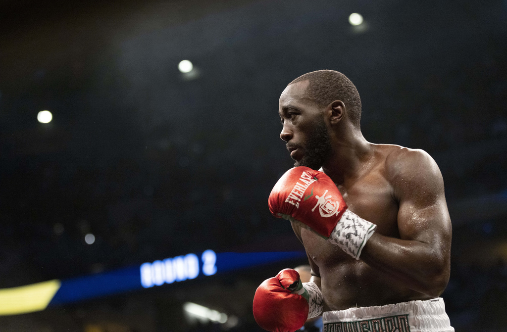 FILE - Terence Crawford fights David Avanesyan during a WBO welterweight title boxing bout on Saturday, Dec. 10, 2022, in Omaha, Neb. (AP Photo/Rebecca S. Gratz, File)