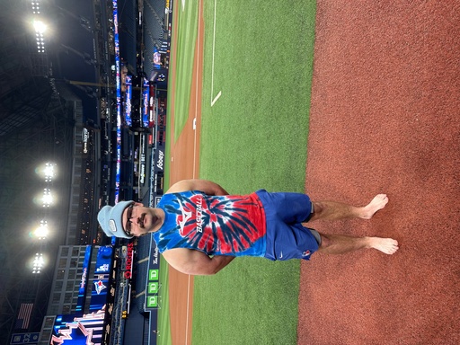 Toronto Blue Jay's Davis Schneider stands on the field barefooted before baseball World Series workouts, Thursday, Oct. 30, 2025, in Toronto. (AP Photo/Ronald Blum) Toronto Blue Jay's Davis Schneider stands on the field barefooted before baseball World Series workouts, Thursday, Oct. 30, 2025, in Toronto. (AP Photo/Ronald Blum)