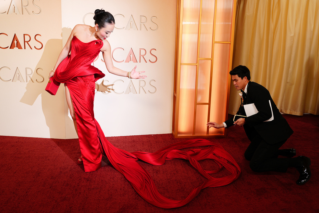 Li Jun Li arrives at the Oscars on Sunday, March 15, 2026, at the Dolby Theatre in Los Angeles. (Photo by Jordan Strauss/Invision/AP)