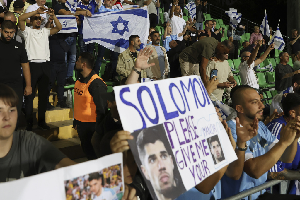 Israel's fans cheer during a group 1, World Cup qualifier soccer match between Moldova and Israel at the ZImbru stadium in Chisinau, Moldova, Friday, Sept. 5, 2025. (AP Photo/Aurel Obreja)