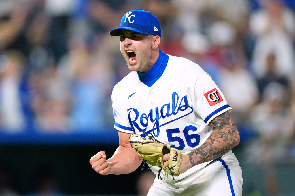 Kansas City Royals' Alex Lange celebrates after a baseball game against the Texas Rangers, Tuesday, June 9, 2026, in Kansas City, Mo. (AP Photo/Charlie Riedel)