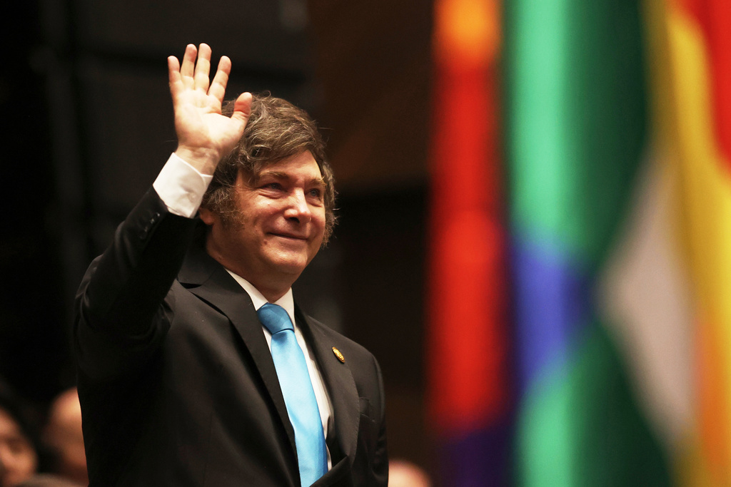 FILE - Argentina's President Javier Milei waves as he attends the swearing-in ceremony of President Rodrigo Paz in La Paz, Bolivia, Nov. 8, 2025. (Luis Gandarillas/Pool Photo via AP, File)