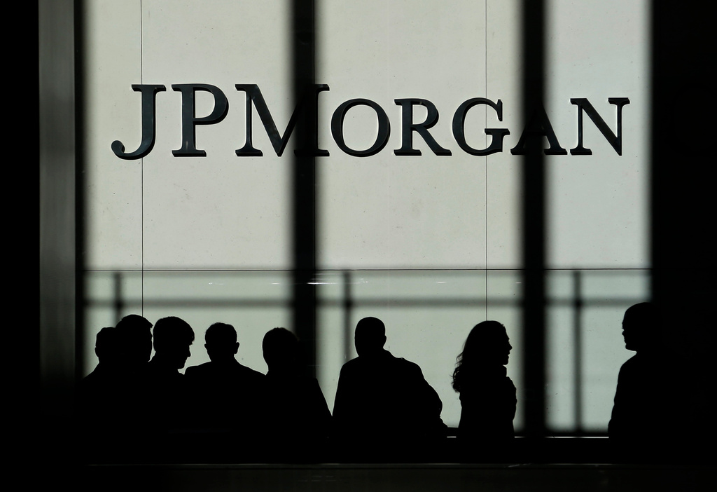FILE - The JPMorgan Chase & Co. logo is displayed at their headquarters Oct. 21, 2013 in New York. (AP Photo/Seth Wenig, File)