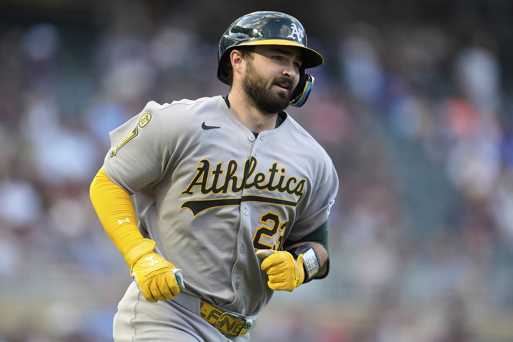 Athletics' Shea Langeliers (23) runs the bases after hitting a 2-run home run during the third inning of a baseball game against the Minnesota Twins Tuesday, Aug. 19, 2025, in Minneapolis. (AP Photo/Abbie Parr)