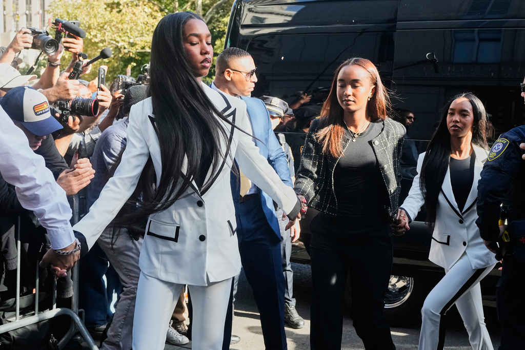 The train daughters of Sean "Diddy" Combs, arrive at Federal Court, in New York, Friday, Oct. 3, 2025. (AP Photo/Richard Drew)