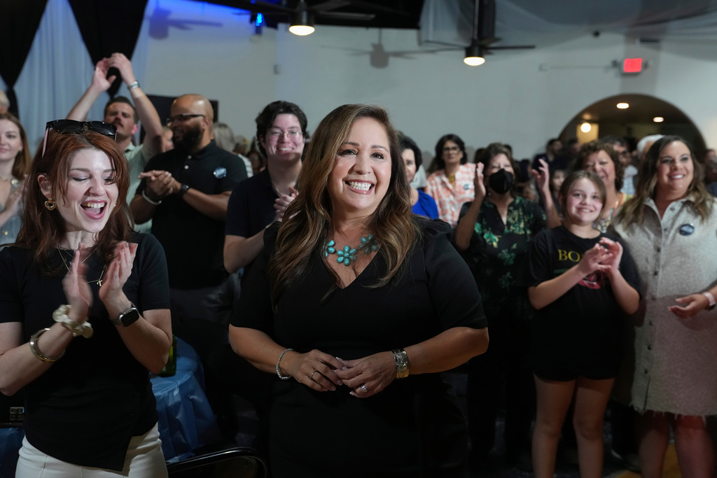 Arizona Democratic candidate Adelita Grijalva smiles as she is introduced to the crowd before being declared the winner against Republican Daniel Butierez to fill the Congressional District 7 seat held by the late U.S. Rep. Raúl Grijalva in a special election Tuesday, Sept. 23, 2025, in Tucson, Ariz. (AP Photo/Ross D. Franklin)