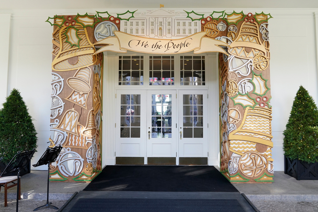 FILE - The entrance to the East Wing of the White House is decorated for the holiday season, Nov. 28, 2022, in Washington. (AP Photo/Patrick Semansky, File)