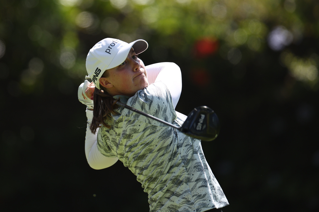 Jennifer Kupcho hits off the 11th tee the during the first round of the U.S. Women's Open golf tournament Thursday, June 4, 2026, in the Pacific Palisades area of Los Angeles. (AP Photo/Jessie Alcheh)