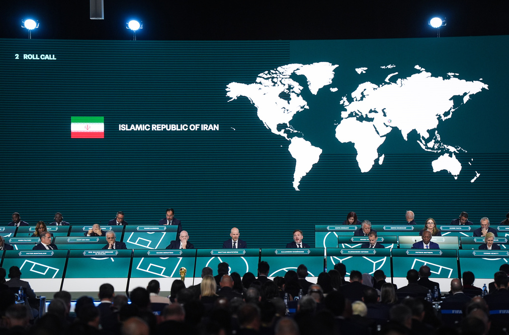 Iran is marked absent as FIFA Secretary General Mattias Grafstrom, fourth from front left, conducts roll call during the 76th FIFA Congress in Vancouver, British Columbia, Thursday, April 30, 2026. (Darryl Dyck/The Canadian Press via AP)