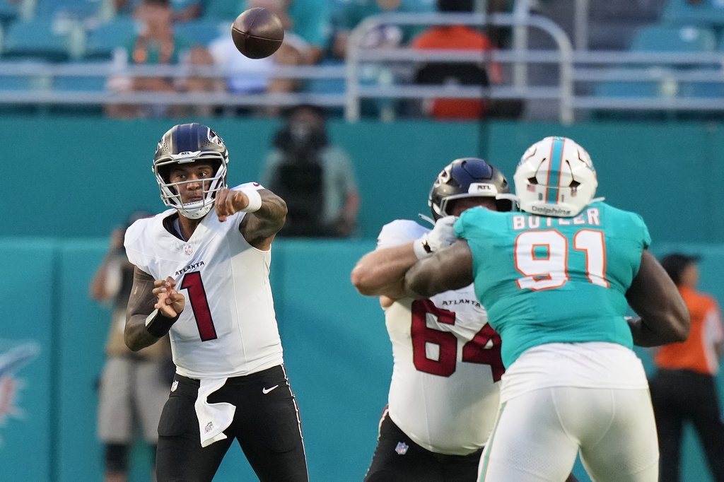 Atlanta Falcons quarterback Tua Tagovailoa (1) passes against the Miami Dolphins during the first half of an NFL preseason football game, Friday, Aug. 28, 2026, in Miami Gardens, Fla. (AP Photo/Lynne Sladky)
