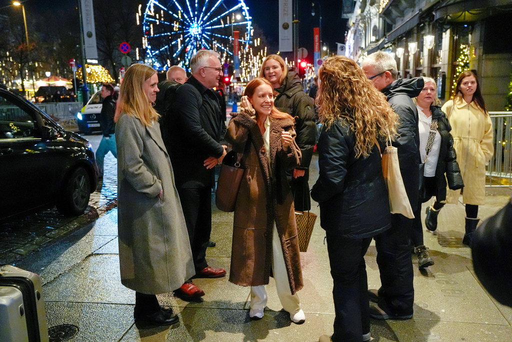Ana Corina Sosa, center, daughter of Nobel peace prize laureate Maria Machados, arrives at the Grand Hotel in Oslo on Monday, Dec. 8, 2025. (Lise Aserud/NTB via AP)