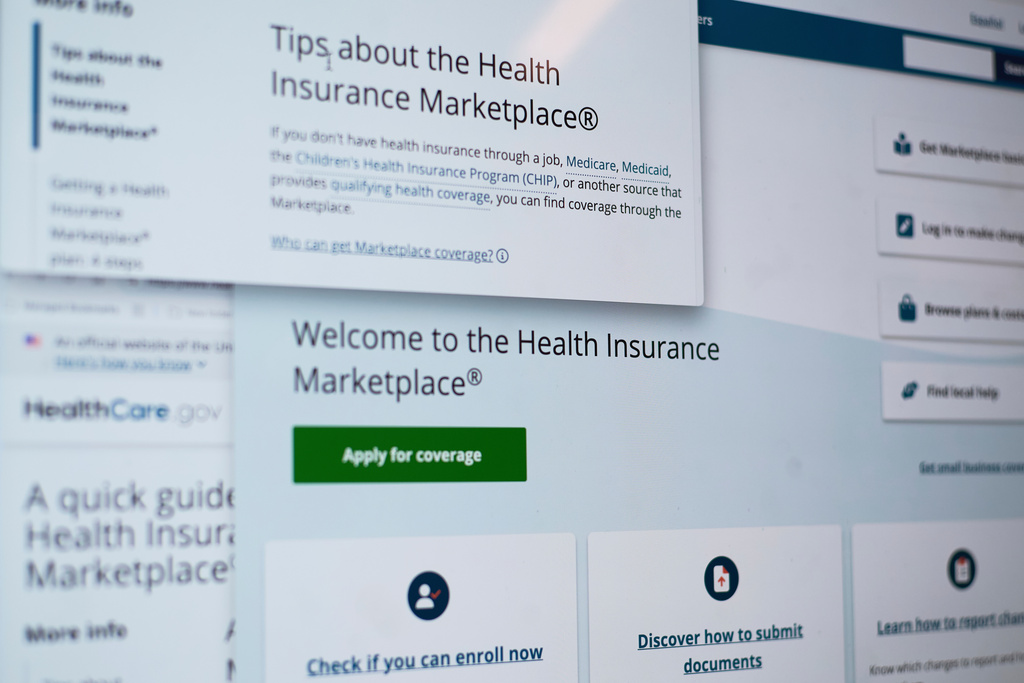 FILE - Pages from the U.S. Affordable Care Act health insurance website healthcare.gov are seen on a computer screen in New York on Tuesday, Aug. 19, 2025. (AP Photo/Patrick Sison, File)