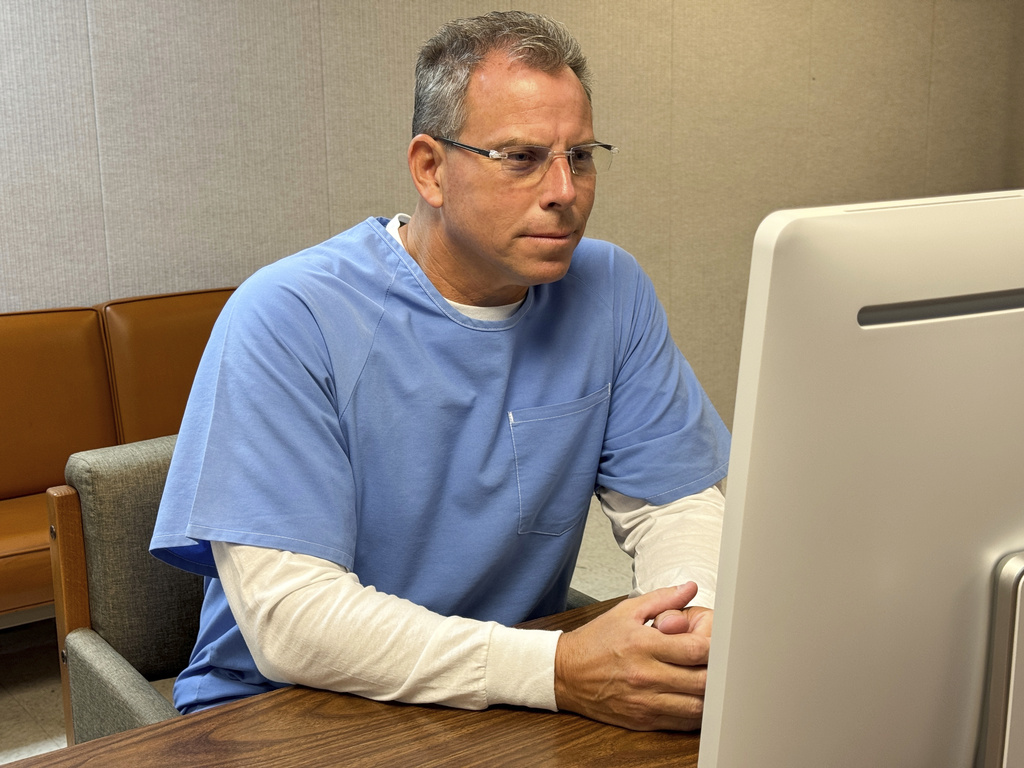 Erik Menendez appears before the parole board via teleconference on Thursday, Aug. 21, 2025, at the Richard J. Donovan Correctional Facility in San Diego. (California Department of Corrections via AP)