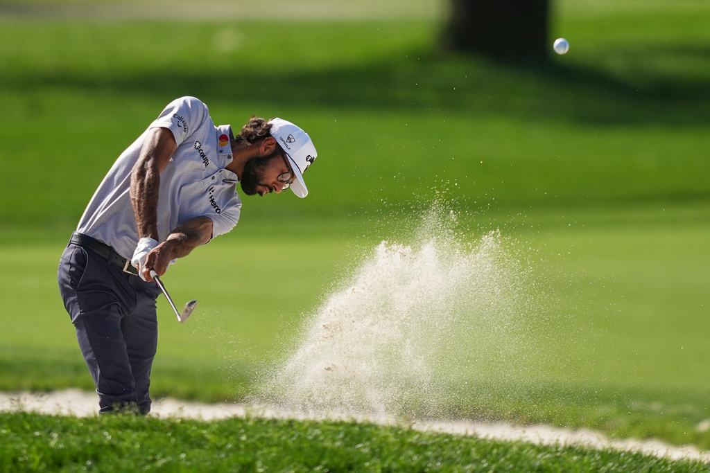 Akshay Bhatia hits from the bunker on the first hole during the first round of the Arnold Palmer Invitational at Bay Hill golf tournament Thursday, March 5, 2026, in Orlando, Fla. (AP Photo/Matt Slocum)