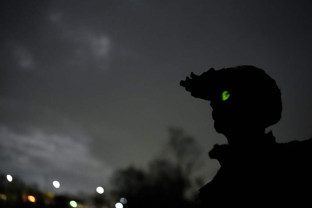 A cadet wears night vision goggles while competing in land navigation during the Sandhurst Military Skills Competition at the United States Military Academy in West Point, N.Y., Friday, May 1, 2026. (AP Photo/Julia Demaree Nikhinson)
