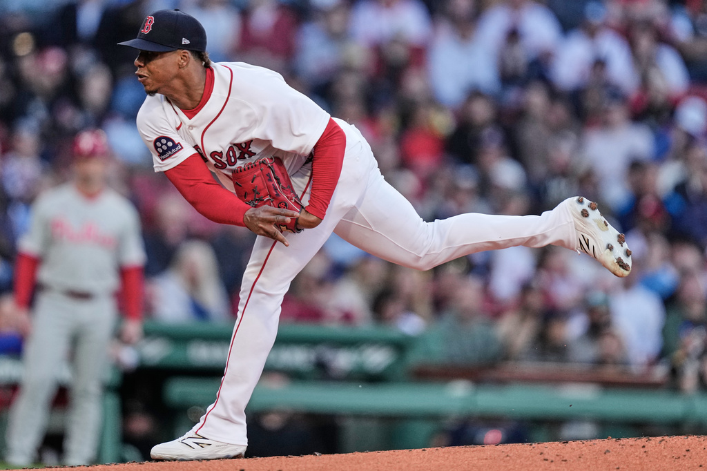 Boston Red Sox pitcher Brayan Bello delivers during the second inning of a baseball game against the Philadelphia Phillies, Tuesday, May 12, 2026, in Boston. (AP Photo/Charles Krupa)