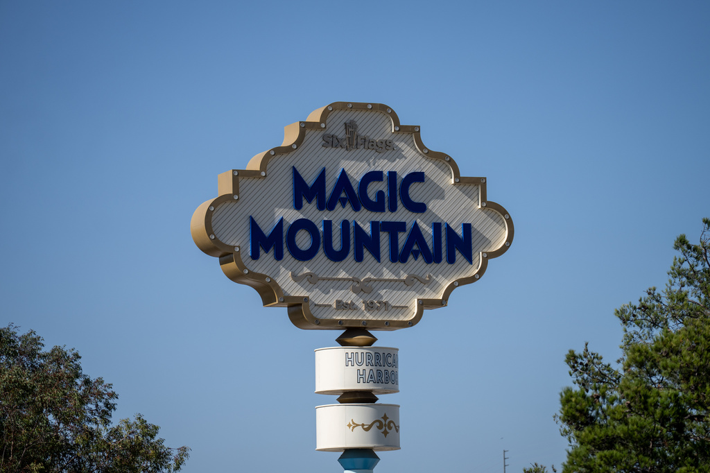 A Six Flags Magic Mountain sign is seen in Valencia, Calif., Wednesday, Sept. 23, 2026. (AP Photo/Jae C. Hong)