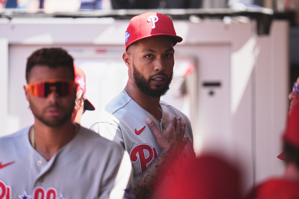 Philadelphia Phillies starting pitcher Cristopher Sánchez pats his chest at the end of the fourth inning of a baseball game against the San Diego Padres Wednesday, May 27, 2026, in San Diego. (AP Photo/Gregory Bull)