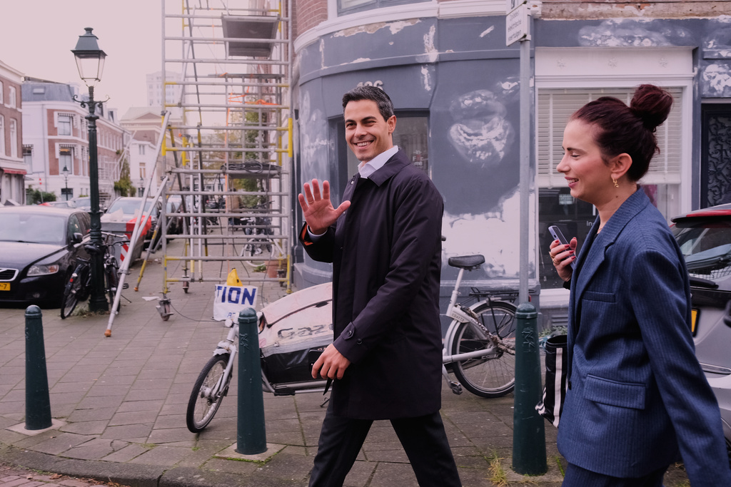 Rob Jetten, leader of the center-left D66 party waves to the media as he leaves a polling station after casting his vote, during general elections in The Hague, Netherlands, Wednesday, Oct. 29, 2025. (AP Photo/Patrick Post)