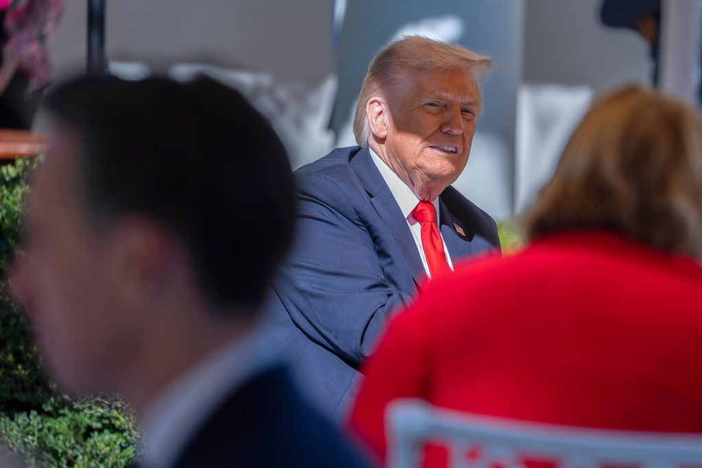 President Donald Trump hosts lunch with Republican Senators on the Rose Garden patio at the White House, Tuesday, Oct. 21, 2025, in Washington. (AP Photo/Manuel Balce Ceneta)
