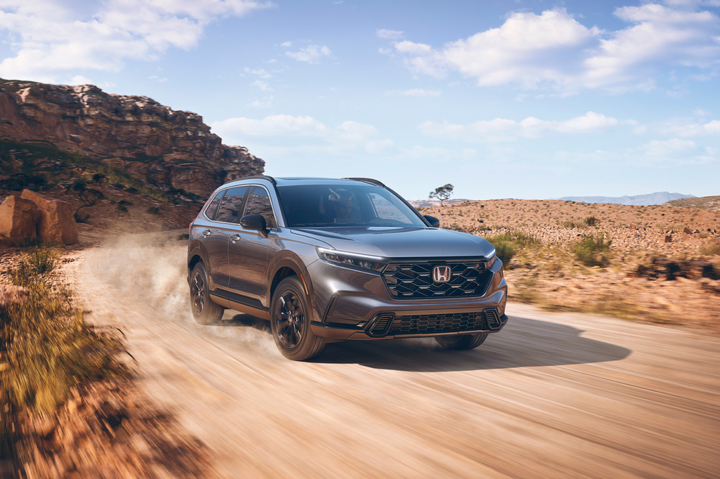 This photo provided by Honda shows the 2023 CR-V, a small SUV that offers roomy seating, a smooth ride, and plenty of cargo space, plus an available hybrid powertrain. (Courtesy of American Honda Motor Co. via AP)