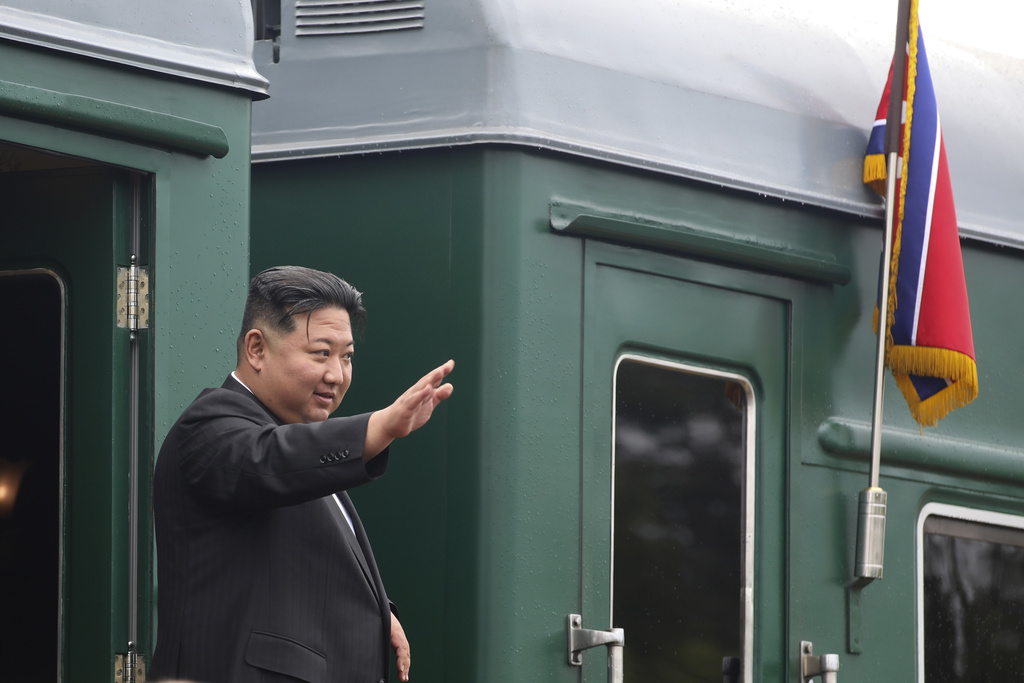 FILE - In this photo released by the Government of Primorsky Krai Region, North Korea's leader Kim Jong Un waves as he boards his train prior to leaving Artyom, near Vladivostok, Russian Far East, Sept. 17, 2023. (Government of Primorsky Krai Region via AP, File)