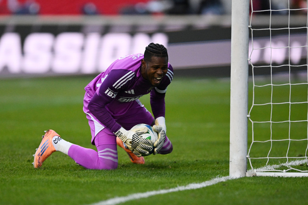 Philadelphia Union goalie Andre Blake celebrates after making a save during the first half of an MLS soccer playoff match against the Chicago Fire, Saturday, Nov. 1, 2025, in Bridgeview, Ill. (AP Photo/Paul Beaty)