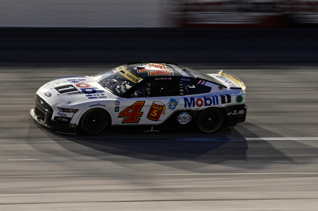 FILE - Kevin Harvick (4) steers out of Turn 4 during a NASCAR Cup Series auto race at Darlington Raceway, Sept. 3, 2023, in Darlington, S.C. (AP Photo/Matt Kelley, File)