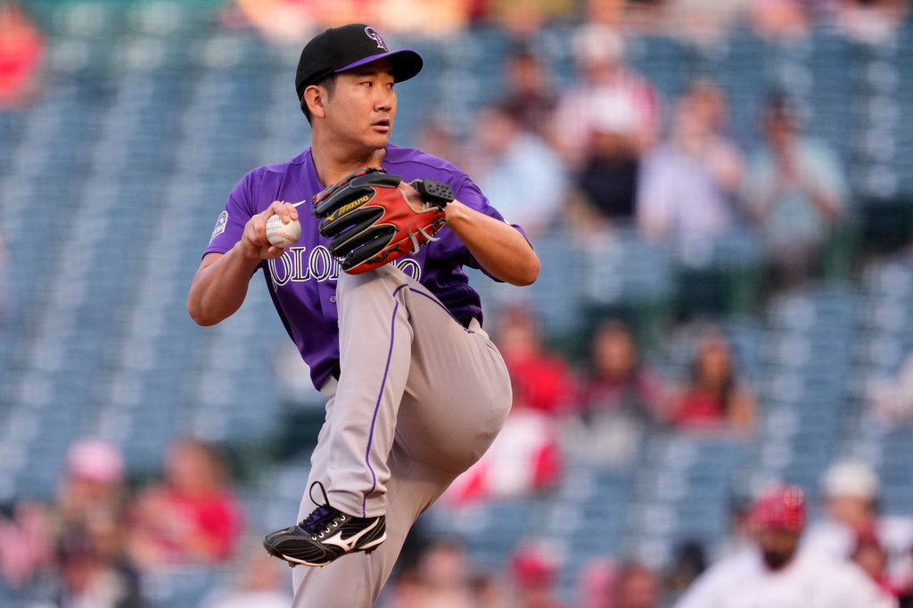 Colorado Rockies pitcher Tomoyuki Sugano throws to the plate during the first inning of a baseball game against the Los Angeles Angels, Tuesday, June 2, 2026, in Anaheim, Calif. (AP Photo/Mark J. Terrill)