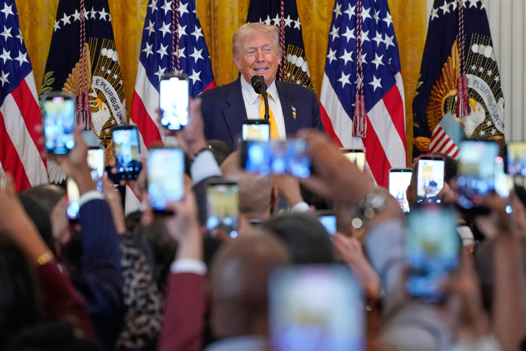 President Donald Trump speaks during a Black History Month event in the East Room of the White House, Wednesday, Feb. 18, 2026, in Washington. (AP Photo/Nathan Howard)