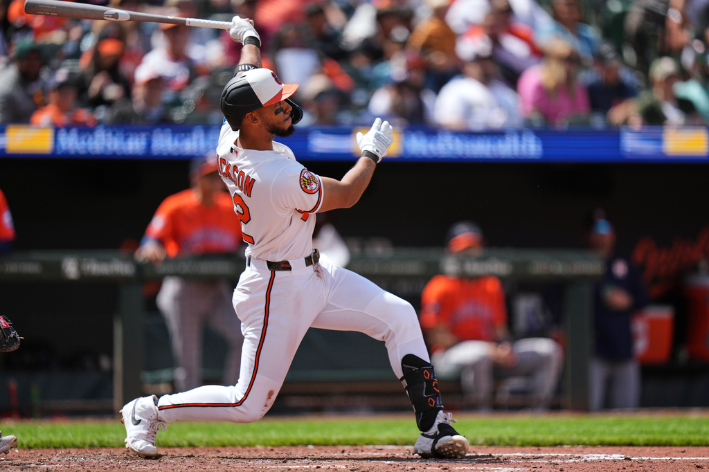 Baltimore Orioles' Jeremiah Jackson hits a grand slam during the seventh inning in the first baseball game of a doubleheader against the Houston Astros, Thursday, April 30, 2026, in Baltimore. (AP Photo/Stephanie Scarbrough)