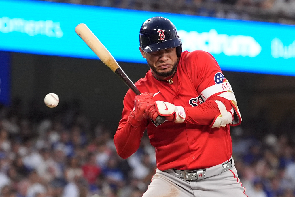Boston Red Sox's Willson Contreras is hit by a pitch during the third inning of a baseball game against the Los Angeles Dodgers, Friday, July 31, 2026, in Los Angeles. (AP Photo/Mark J. Terrill)