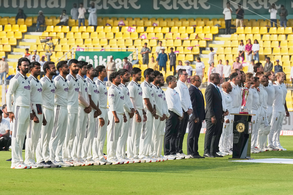India and South Africa cricket team stand for their national anthem before start the first day of the second cricket test match between India and South Africa in Guwahati, India, Saturday, Nov. 22, 2025. (AP Photo/Anupam Nath)