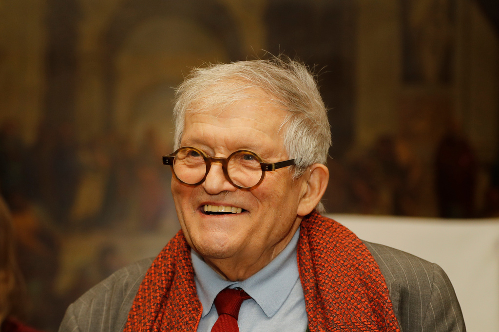 FILE - Artist David Hockney after unveiling the bottle design for the 2014 vintage wine of Château Mouton Rothschild in London, Friday, Feb. 3, 2017. (AP Photo/Frank Augstein, File)