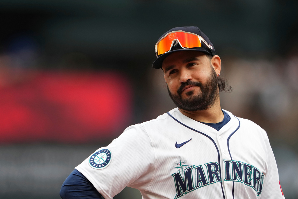 FILE - Seattle Mariners third baseman Eugenio Suarez looks on during a baseball game against the San Diego Padres, Aug. 27, 2025, in Seattle. (AP Photo/Lindsey Wasson, File)