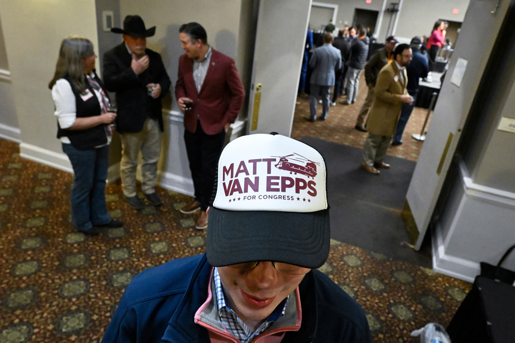 Carson Baddeley and other supporters gather for an election night watch party for Republican candidate Matt Van Epps who is running in a special election for U.S. seventh congressional district seat, Tuesday, Dec. 2, 2025, in Nashville, Tenn. (AP Photo/John Amis)