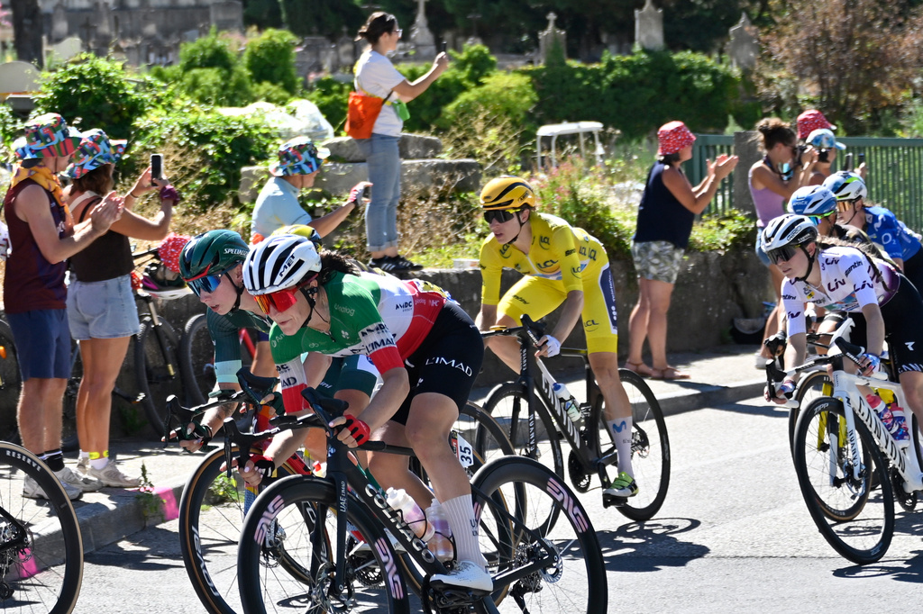 Switzerland's Marlen Reusser, center, competes during the seventh stage of the Women's Tour de France cycling race (Tour de France Femmes) between La Voulte-sur-Rhone and Mont Ventoux in Malaucene, France, Friday, Aug. 7, 2026. (AP Photo/Philippe Magoni)